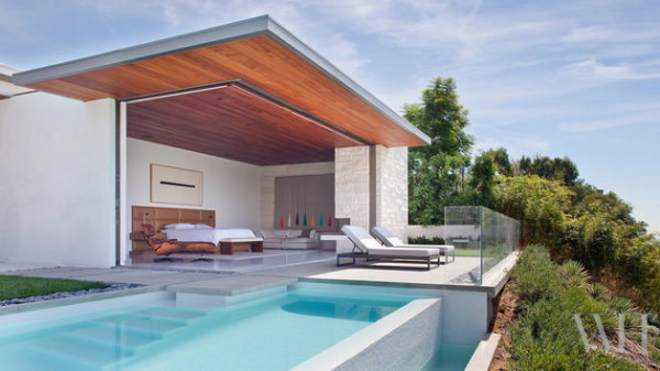casa contemporanea com quarto aberto pra piscina